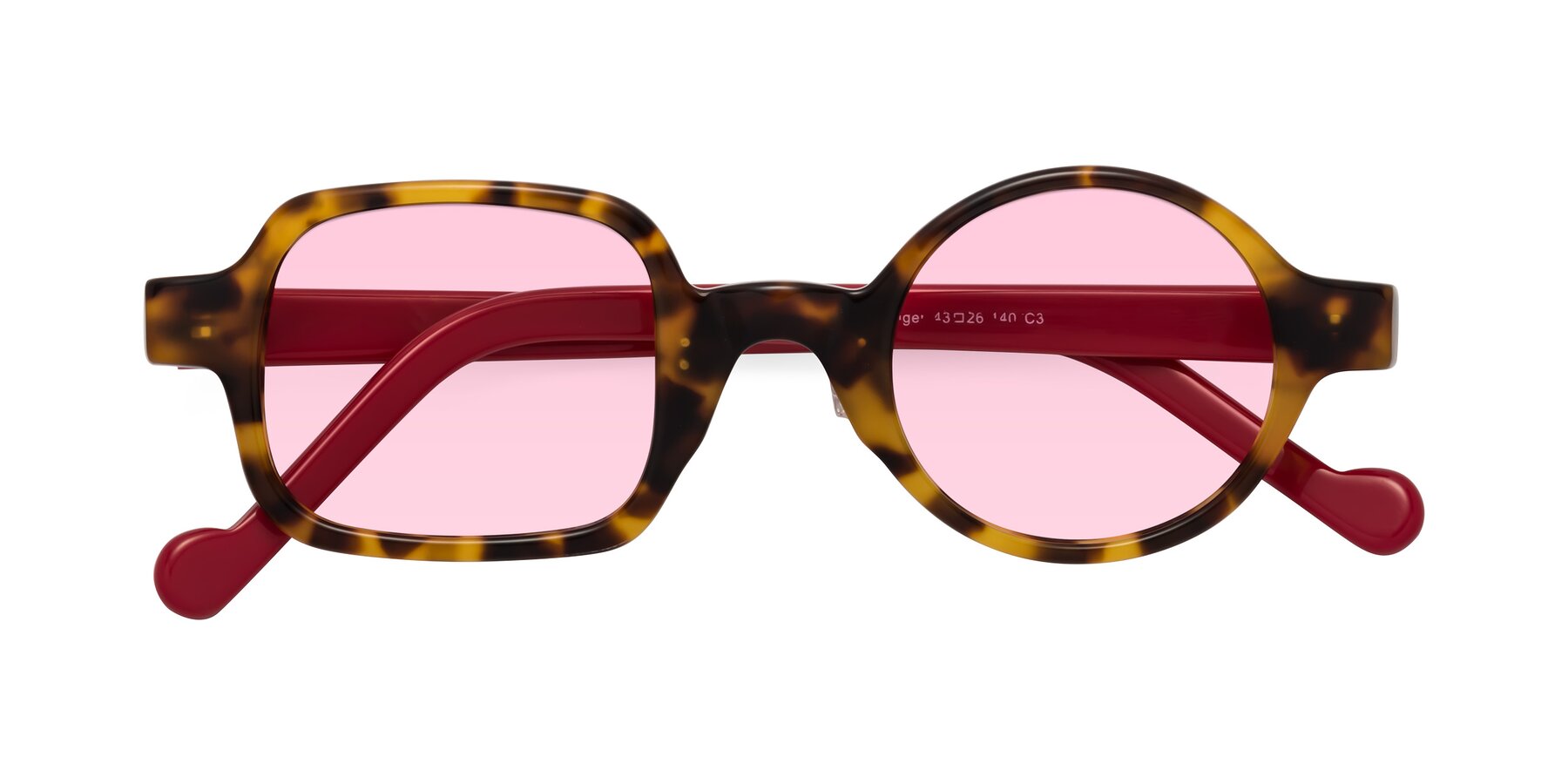 Folded Front of Singer in Tortoise with Light Pink Tinted Lenses