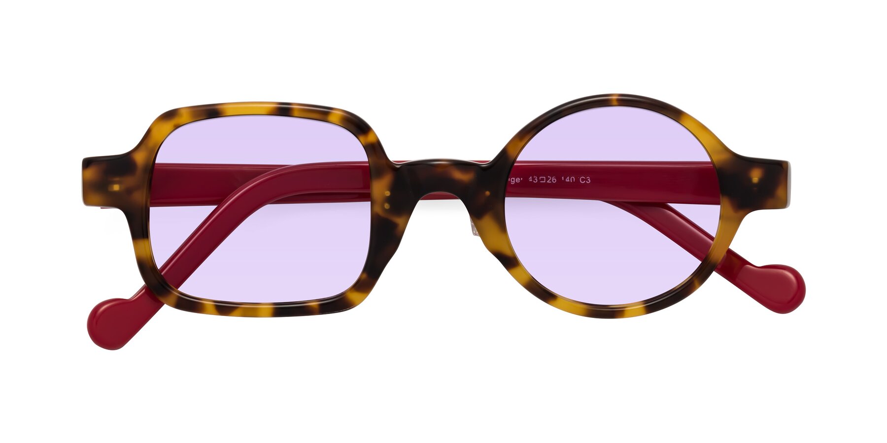 Folded Front of Singer in Tortoise with Light Purple Tinted Lenses