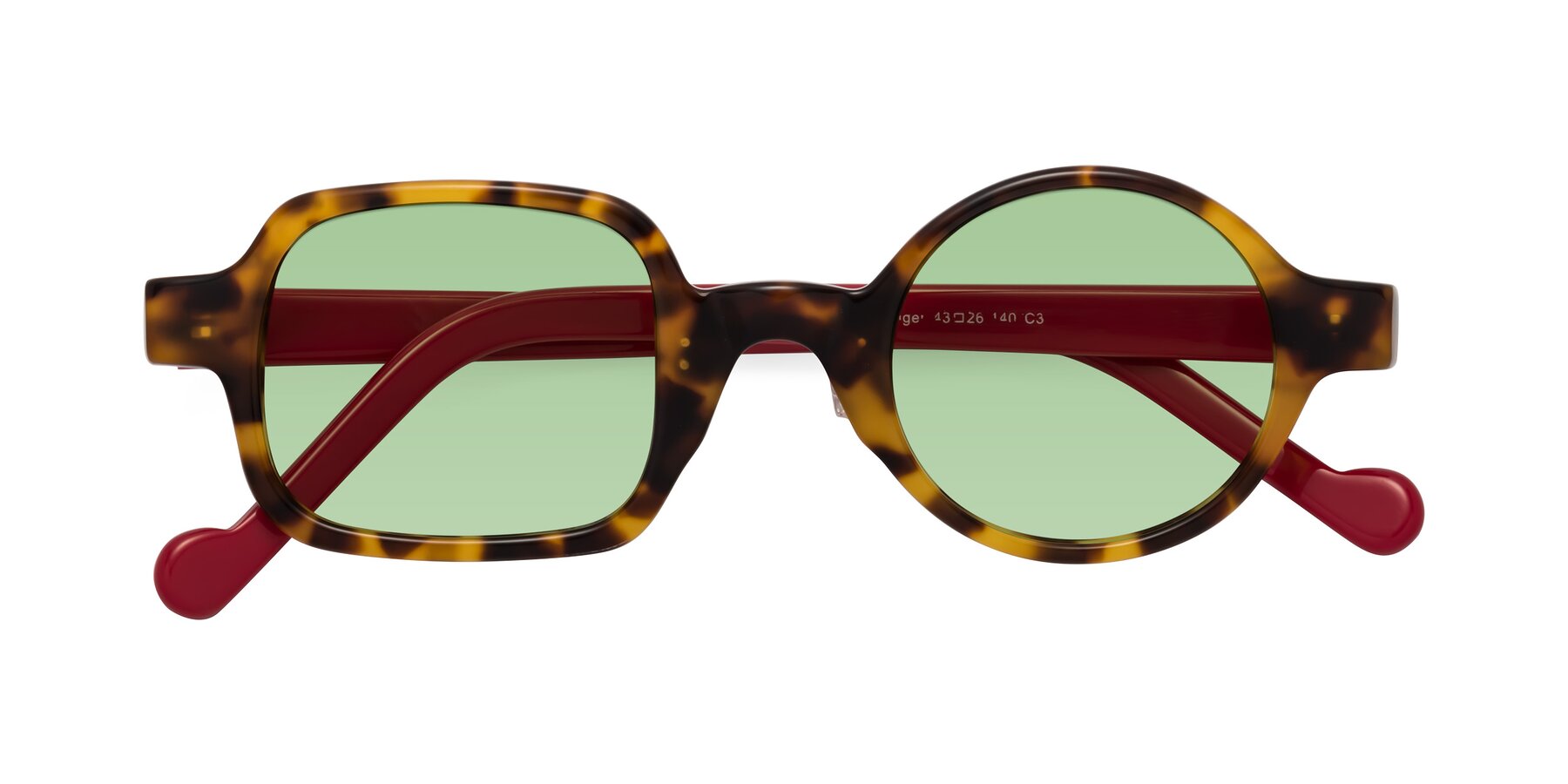 Folded Front of Singer in Tortoise with Medium Green Tinted Lenses