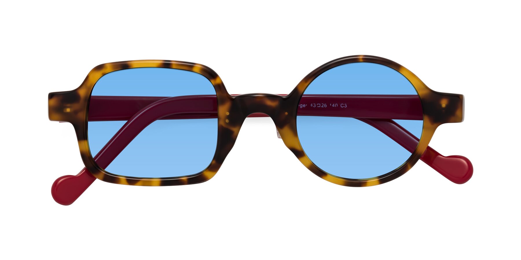 Folded Front of Singer in Tortoise with Medium Blue Tinted Lenses