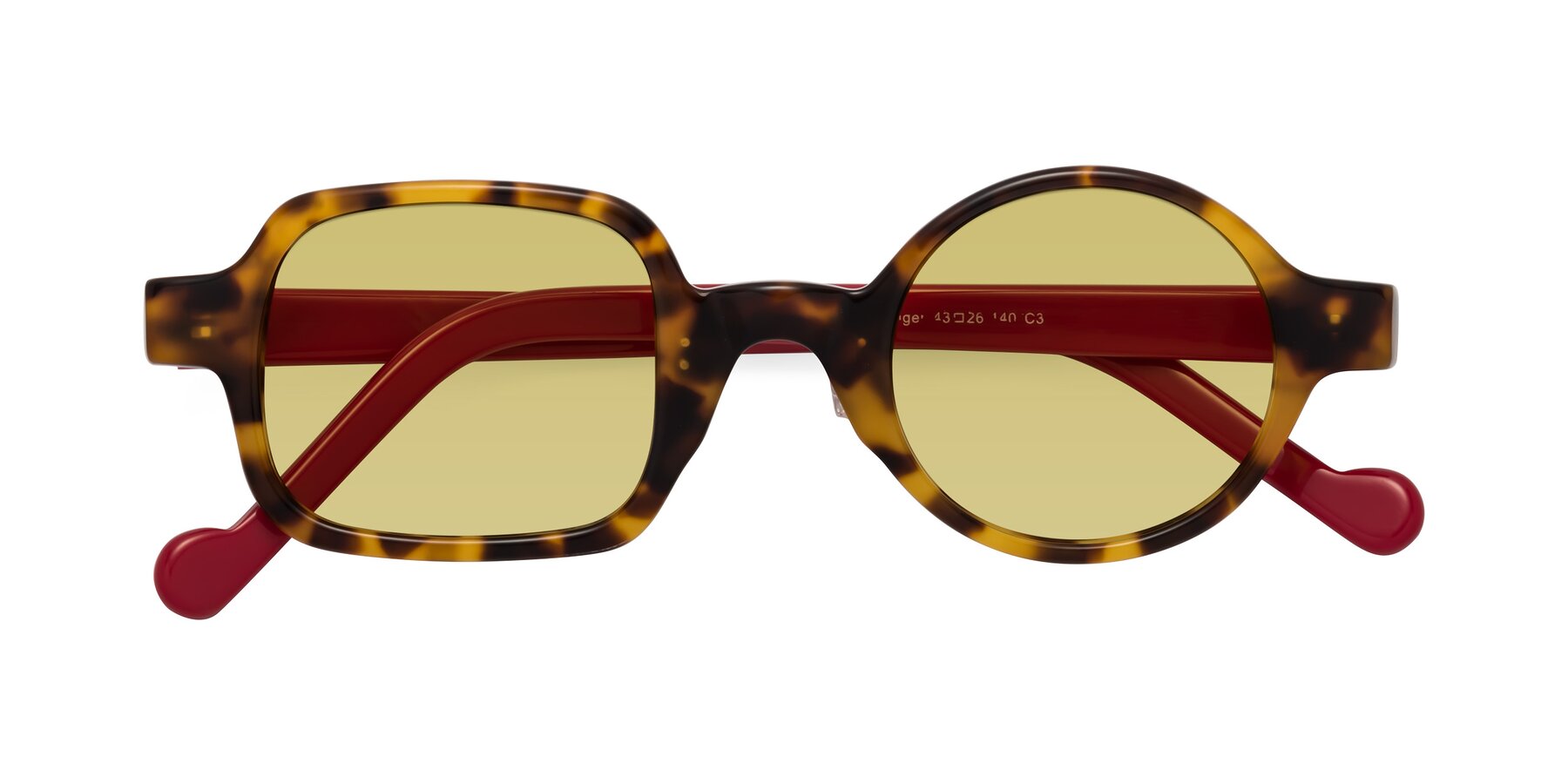 Folded Front of Singer in Tortoise with Medium Champagne Tinted Lenses