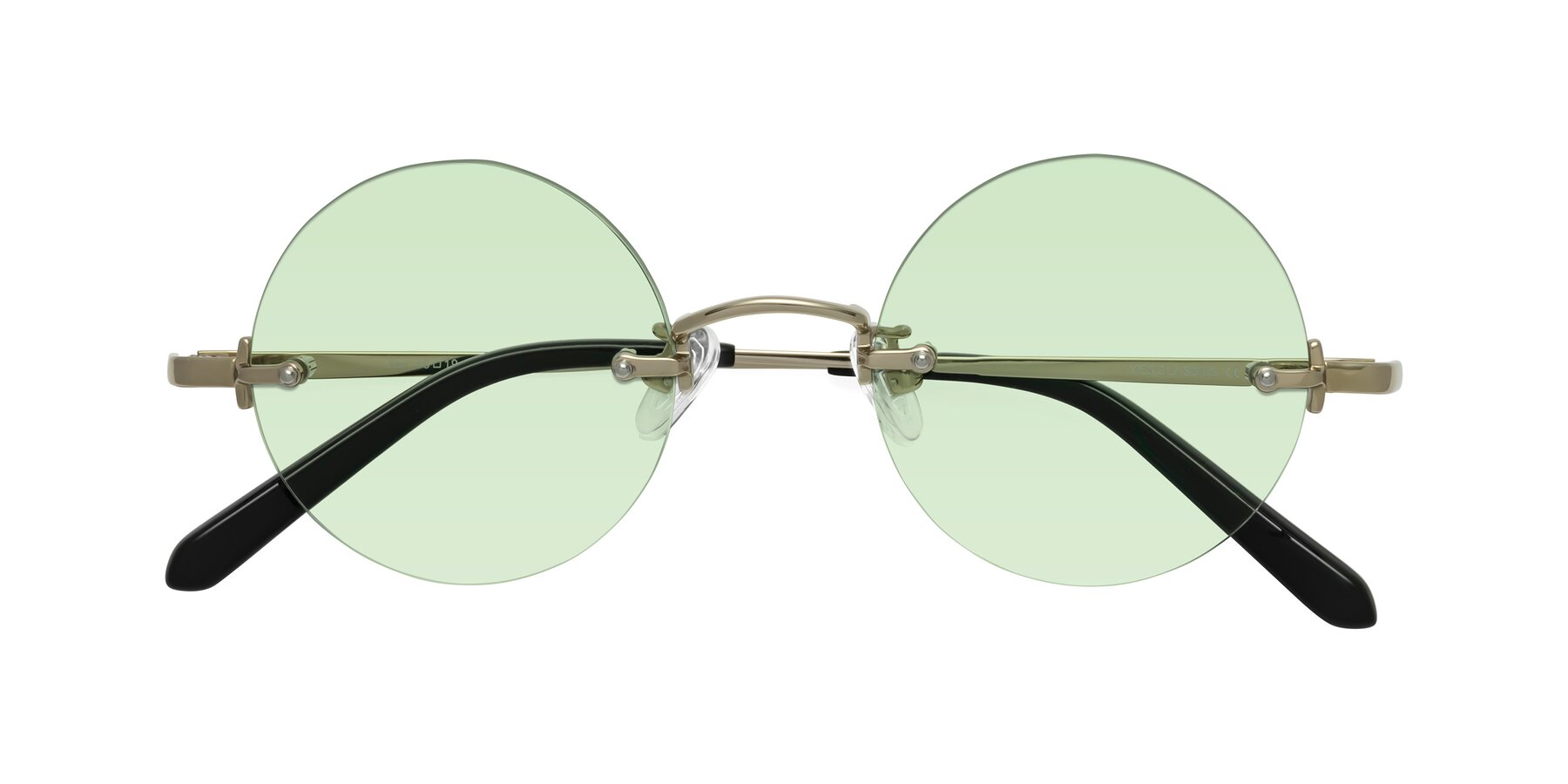 Folded Front of Jen in Gold with Light Green Tinted Lenses