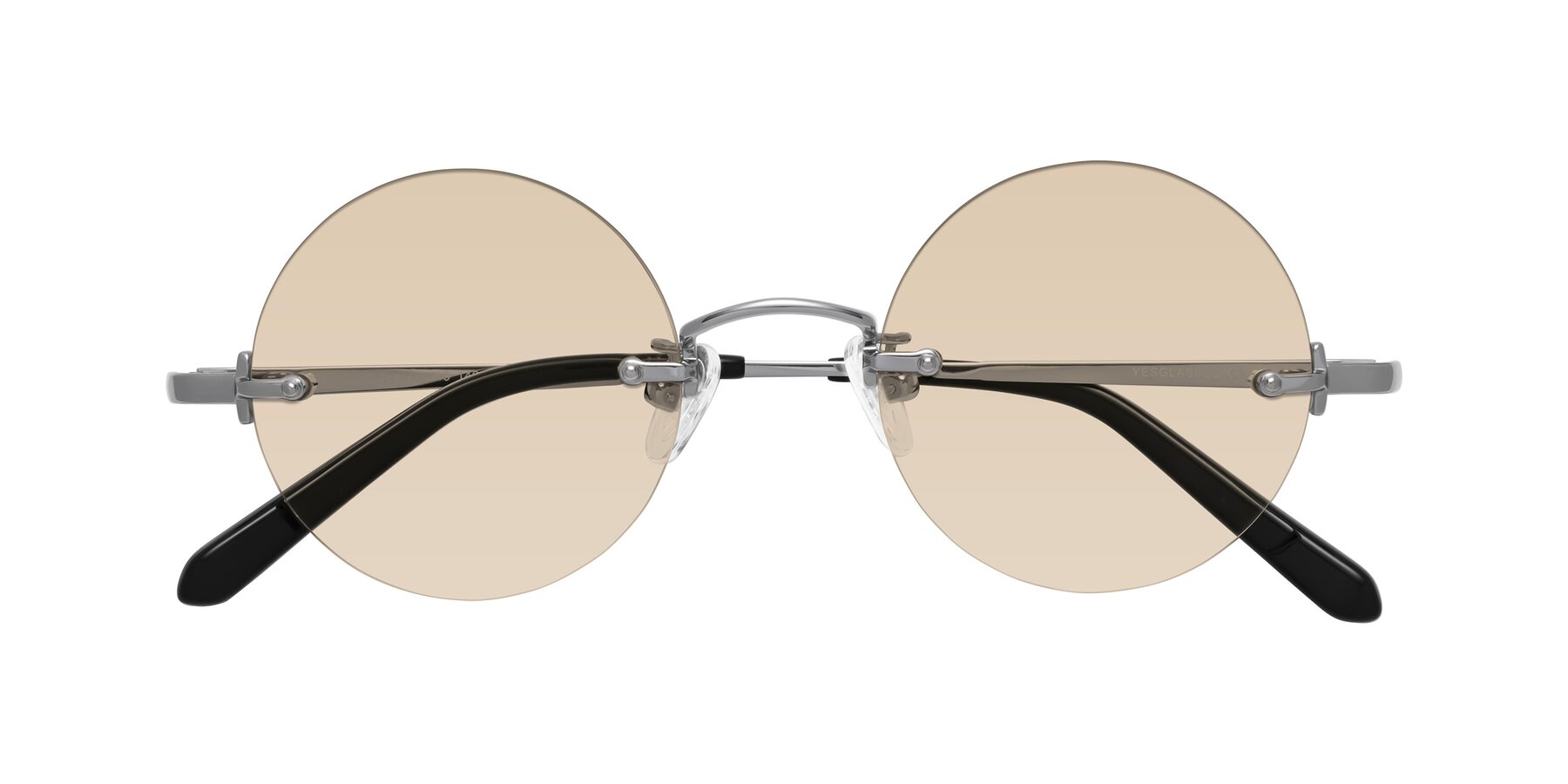 Folded Front of Jen in Silver with Light Brown Tinted Lenses