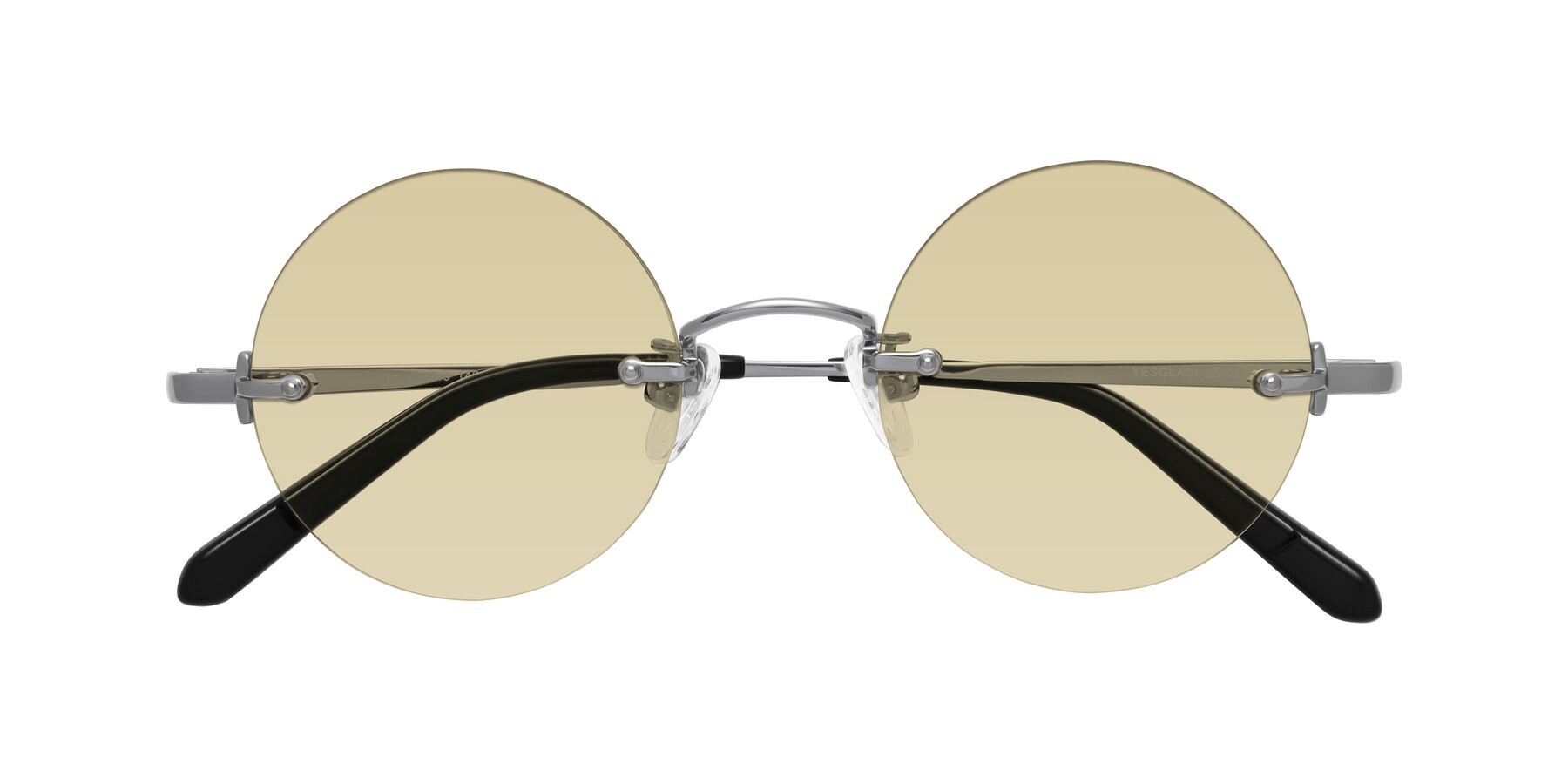 Folded Front of Jen in Silver with Light Champagne Tinted Lenses