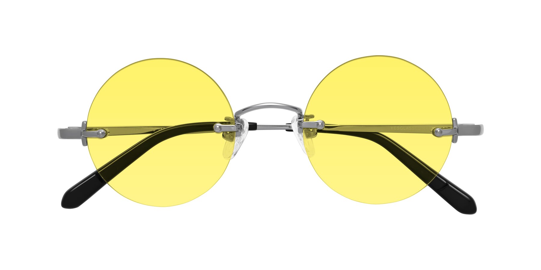 Folded Front of Jen in Silver with Medium Yellow Tinted Lenses