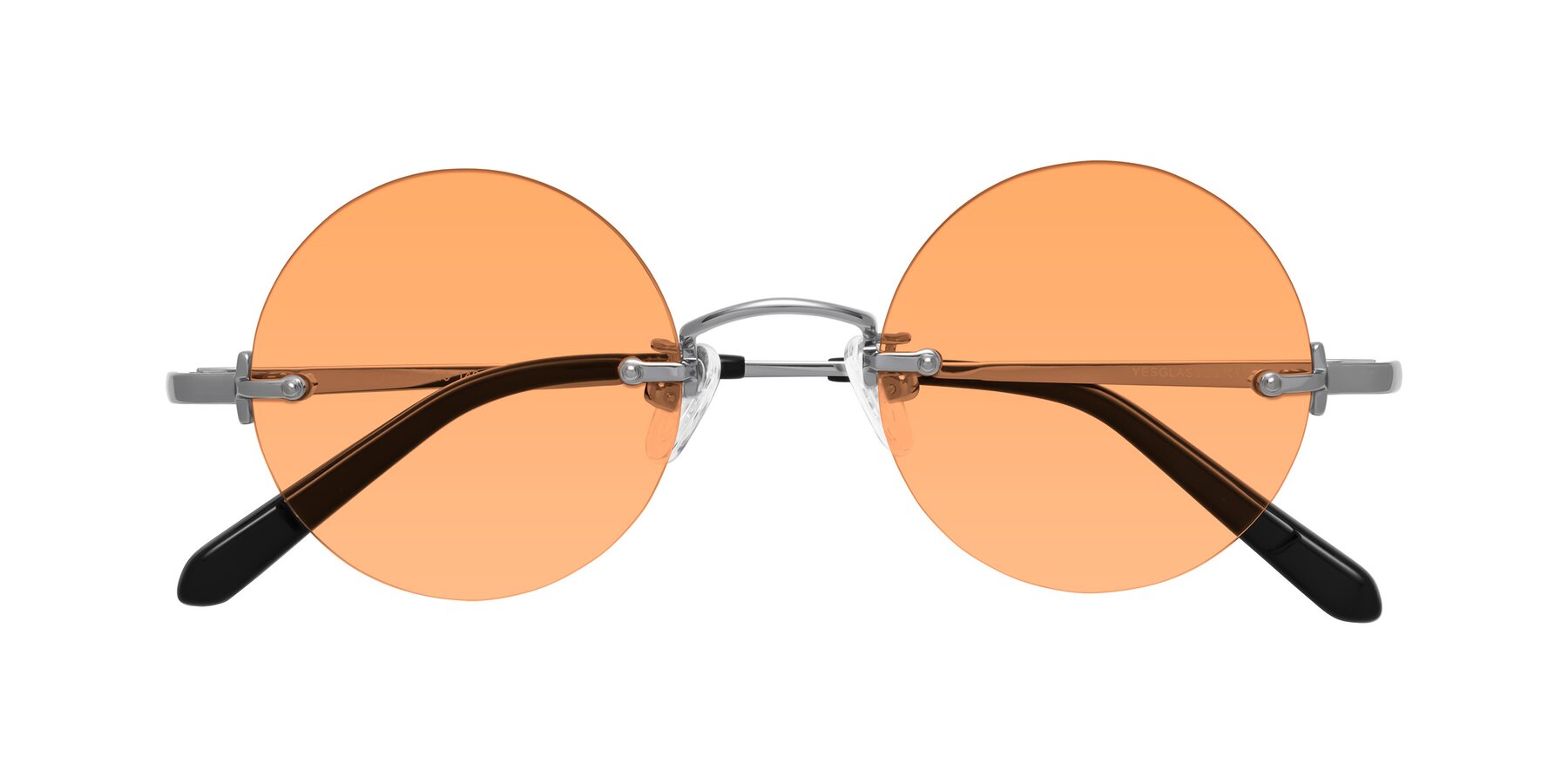 Folded Front of Jen in Silver with Medium Orange Tinted Lenses