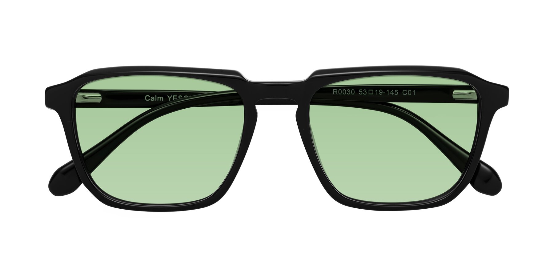 Folded Front of Calm in Black with Medium Green Tinted Lenses