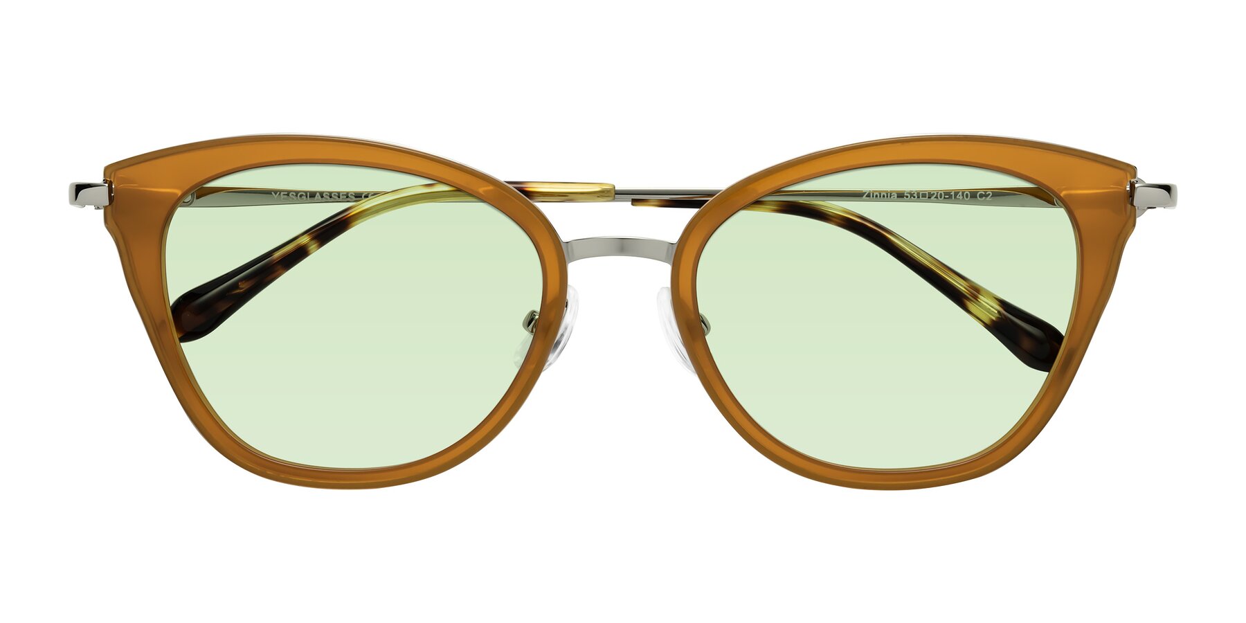 Folded Front of Zinnia in Caramel with Light Green Tinted Lenses