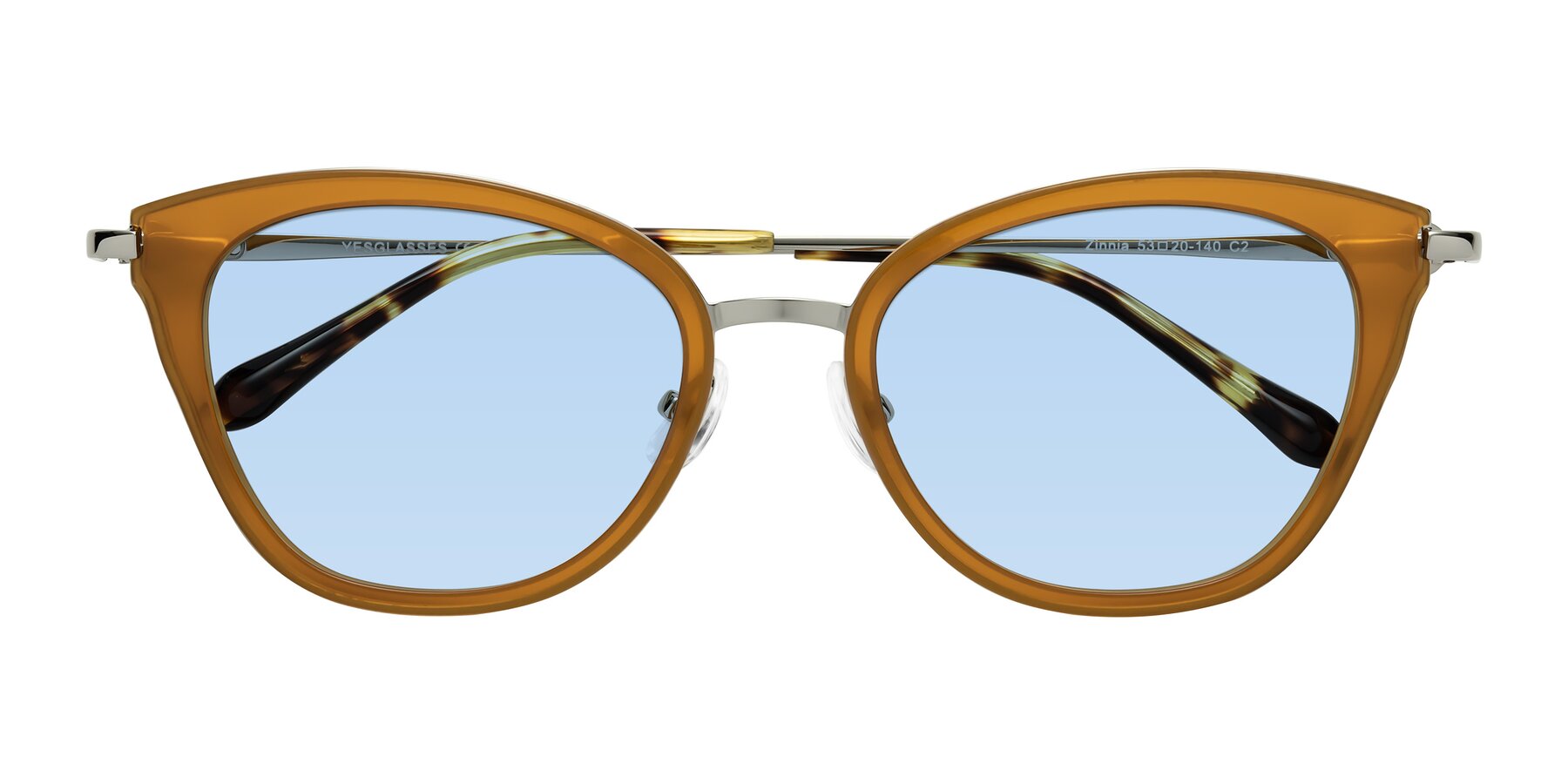 Folded Front of Zinnia in Caramel with Light Blue Tinted Lenses