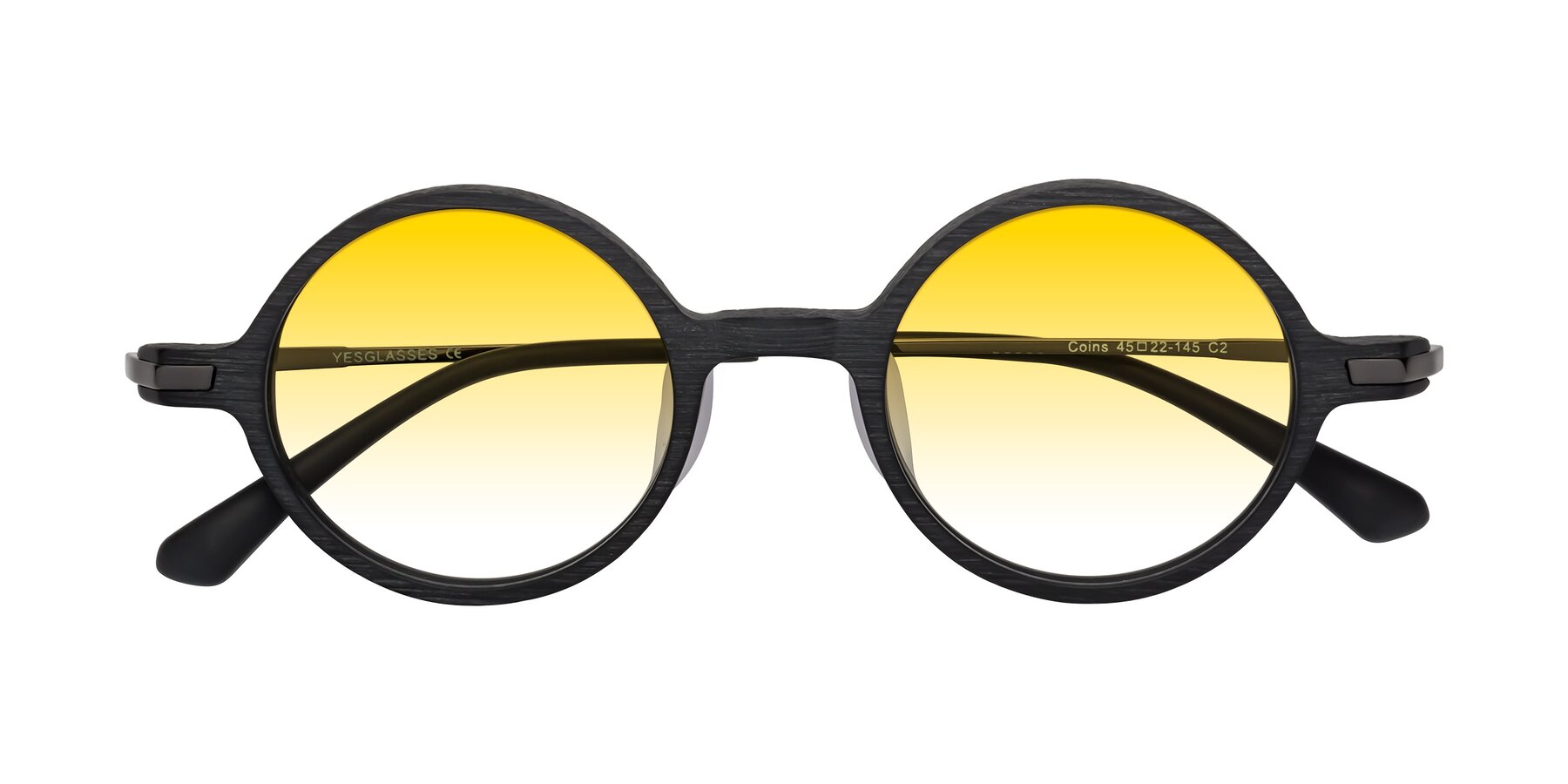 Folded Front of Coins in Dark Gray Woodgrain with Yellow Gradient Lenses