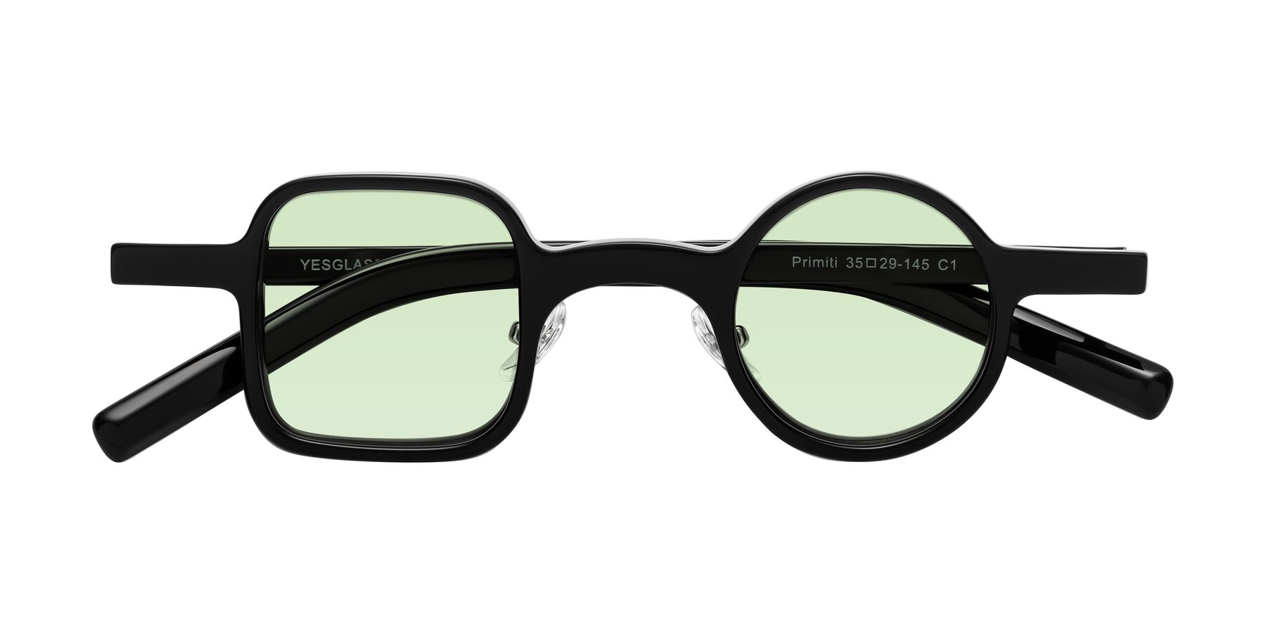 Folded Front of Primiti in Black with Light Green Tinted Lenses