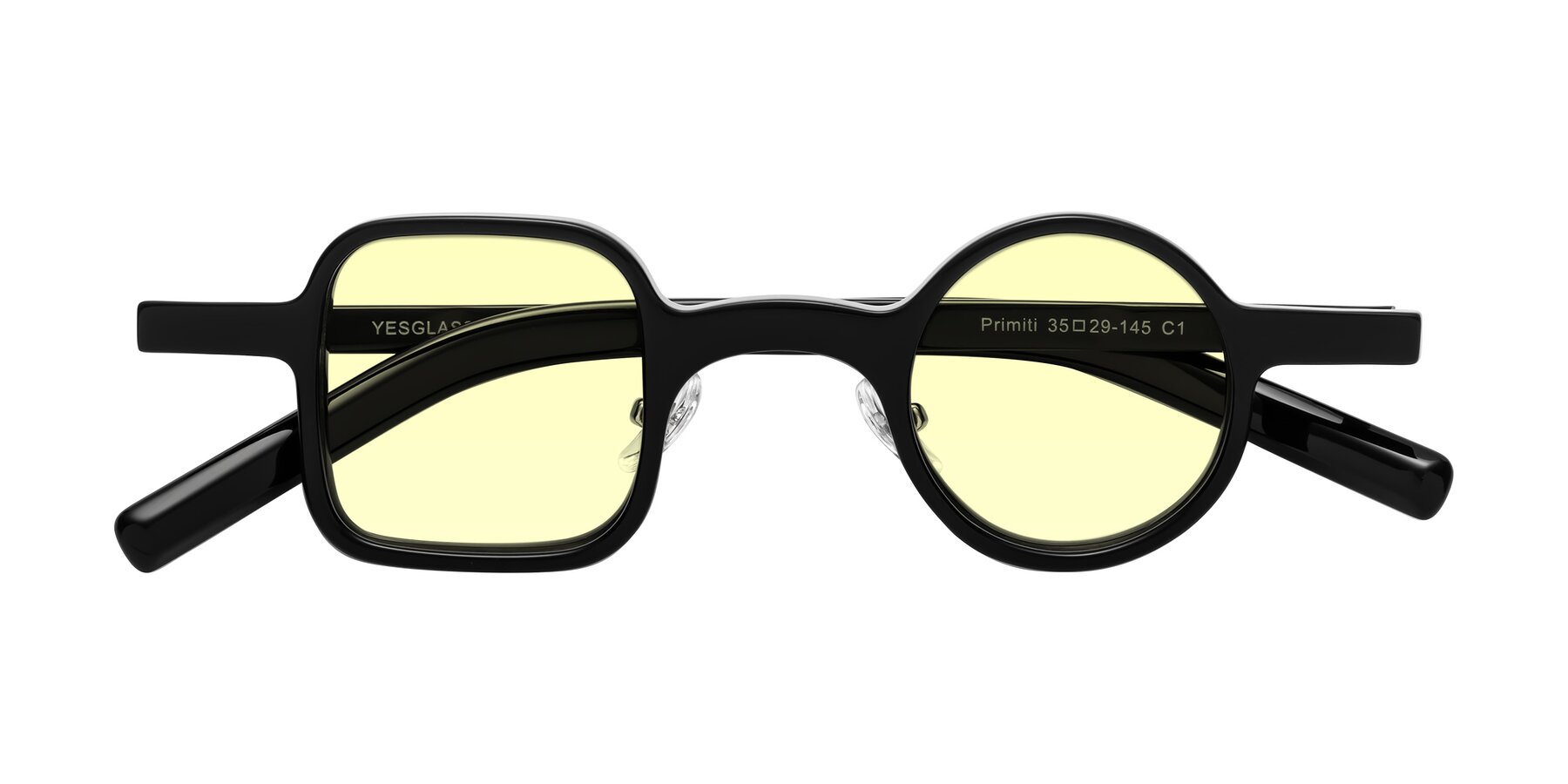 Folded Front of Primiti in Black with Light Yellow Tinted Lenses