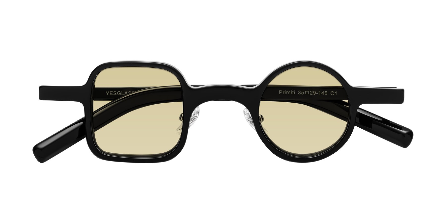 Folded Front of Primiti in Black with Light Champagne Tinted Lenses