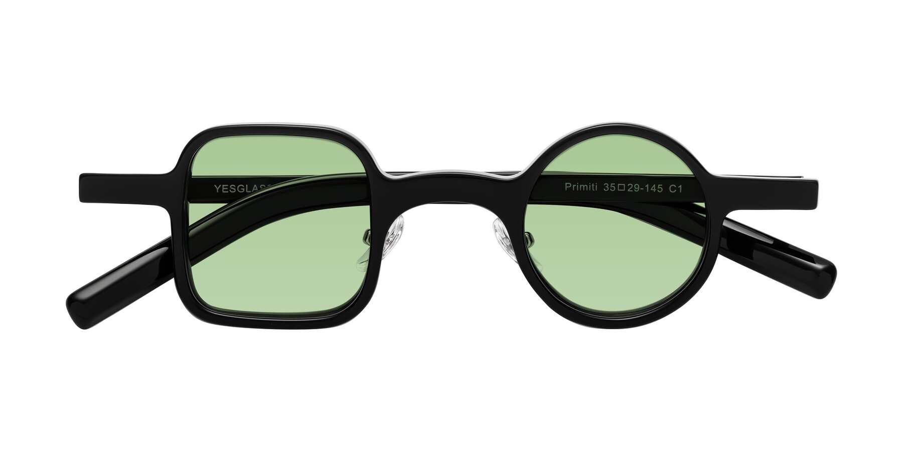 Folded Front of Primiti in Black with Medium Green Tinted Lenses