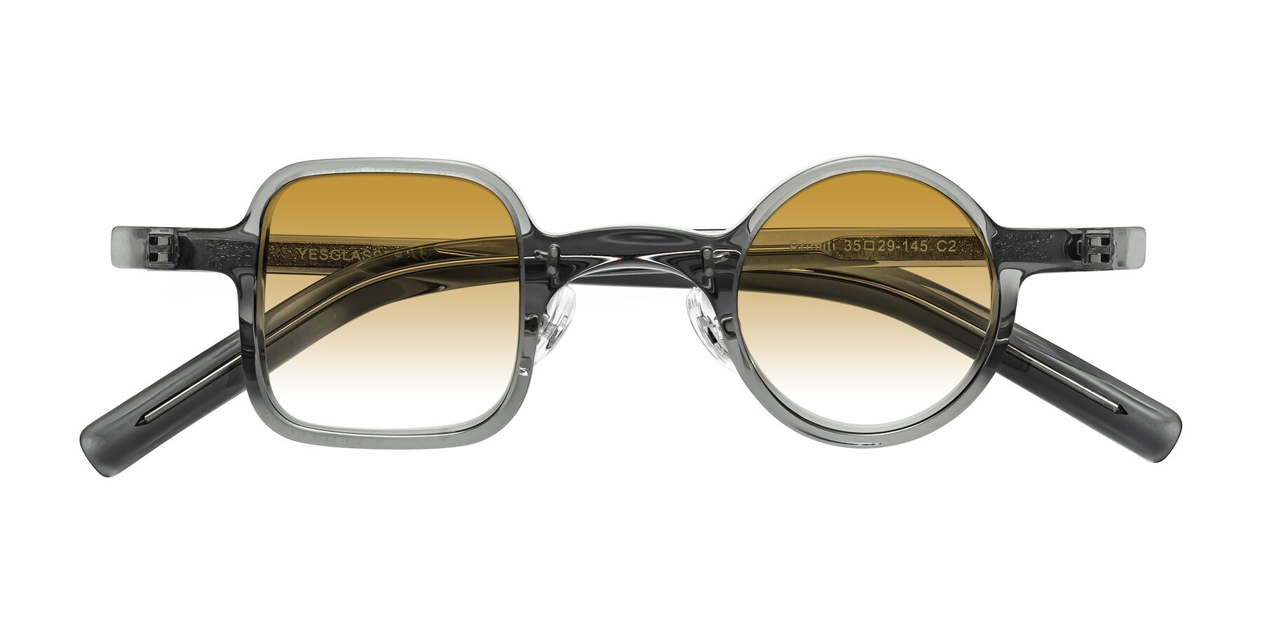 Folded Front of Primiti in Gray with Champagne Gradient Lenses