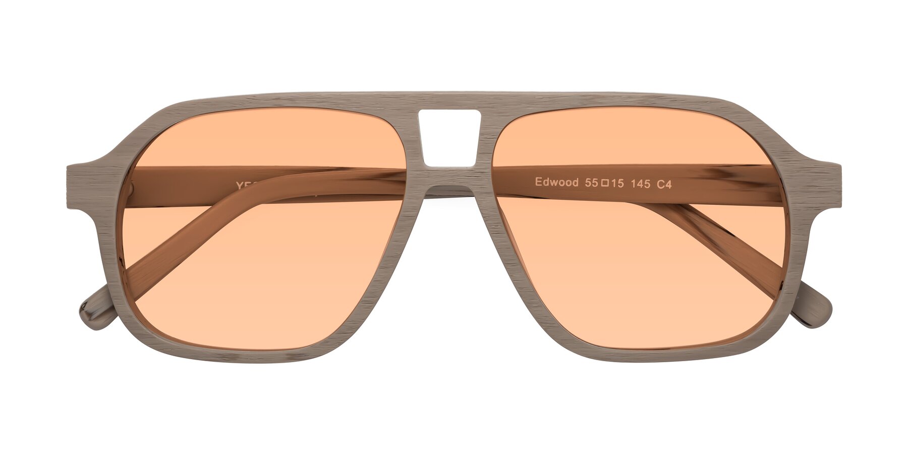 Folded Front of Edwood in Pale Mauve Woodgrain with Light Orange Tinted Lenses