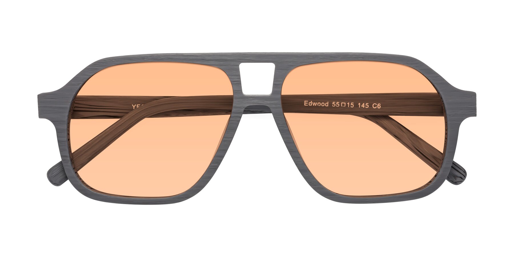 Folded Front of Edwood in Cement Woodgrain with Light Orange Tinted Lenses