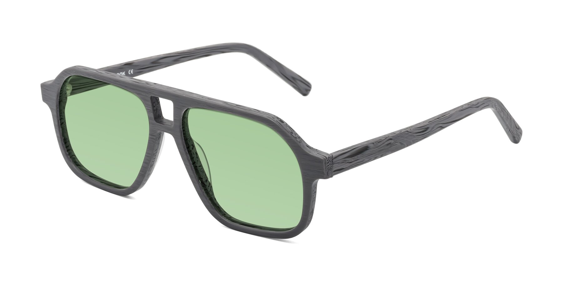 Angle of Edwood in Cement Woodgrain with Medium Green Tinted Lenses