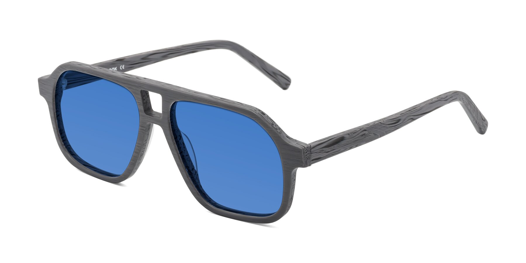 Angle of Edwood in Cement Woodgrain with Blue Tinted Lenses