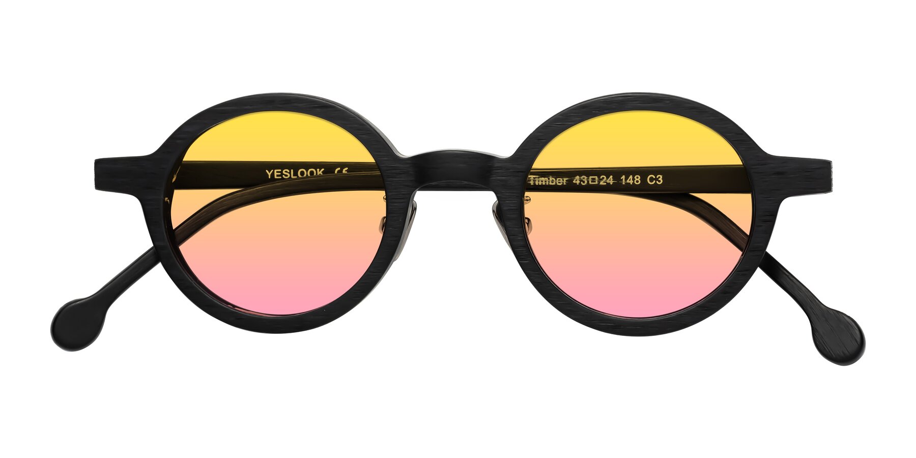 Folded Front of Timber in Black Woodgrain with Yellow / Pink Gradient Lenses