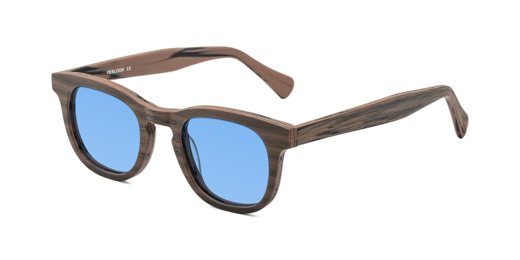 Angle of Tonia in Burnt Tan Woodgrain with Medium Blue Tinted Lenses