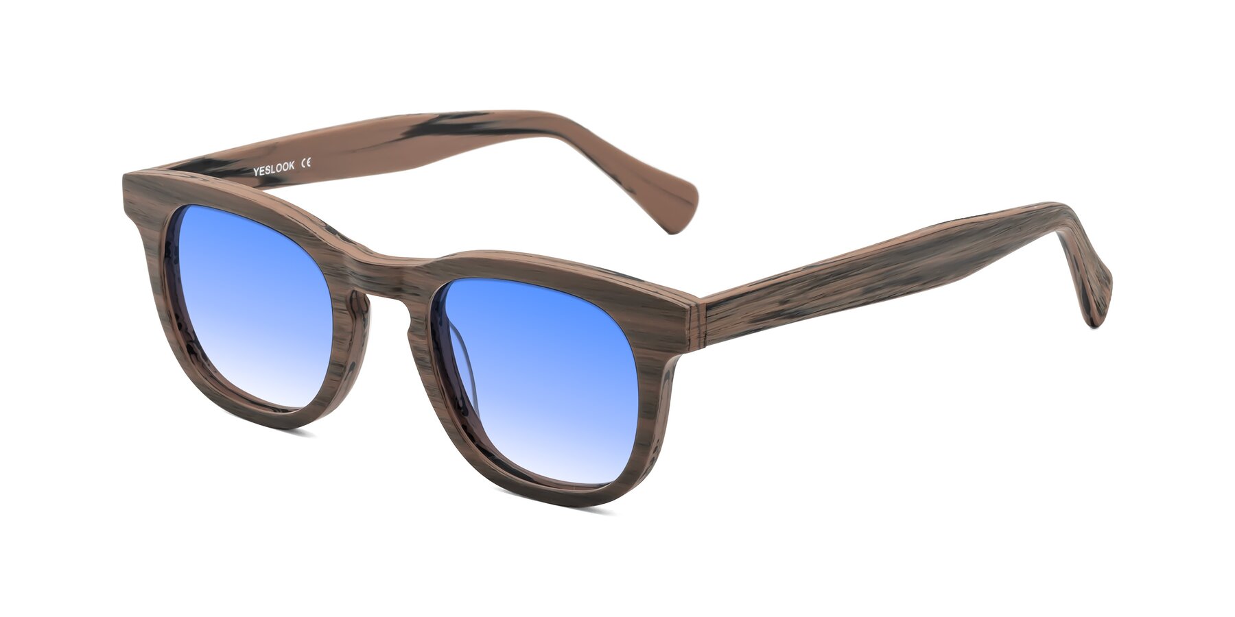 Angle of Tonia in Burnt Tan Woodgrain with Blue Gradient Lenses