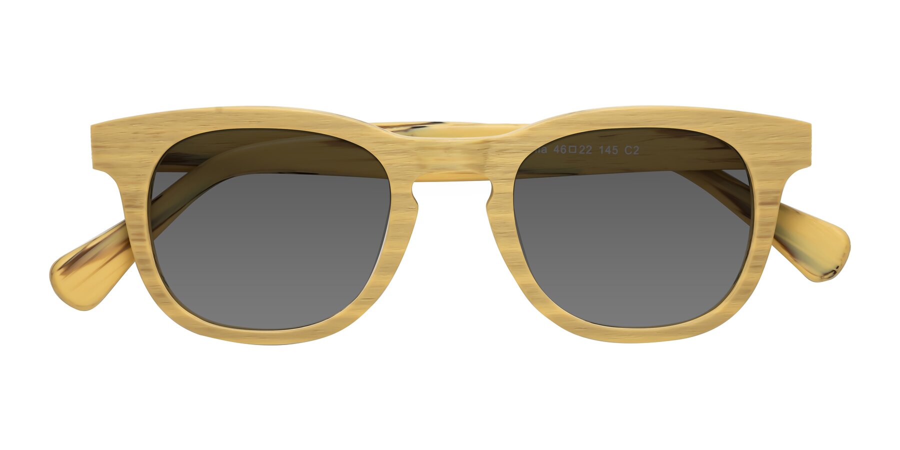 Folded Front of Tonia in Egg Yolk Woodgrain with Medium Gray Tinted Lenses