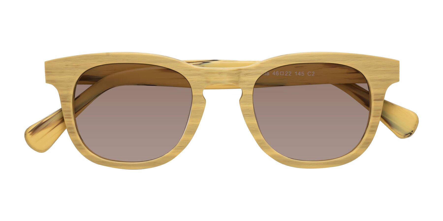 Folded Front of Tonia in Egg Yolk Woodgrain with Medium Brown Tinted Lenses