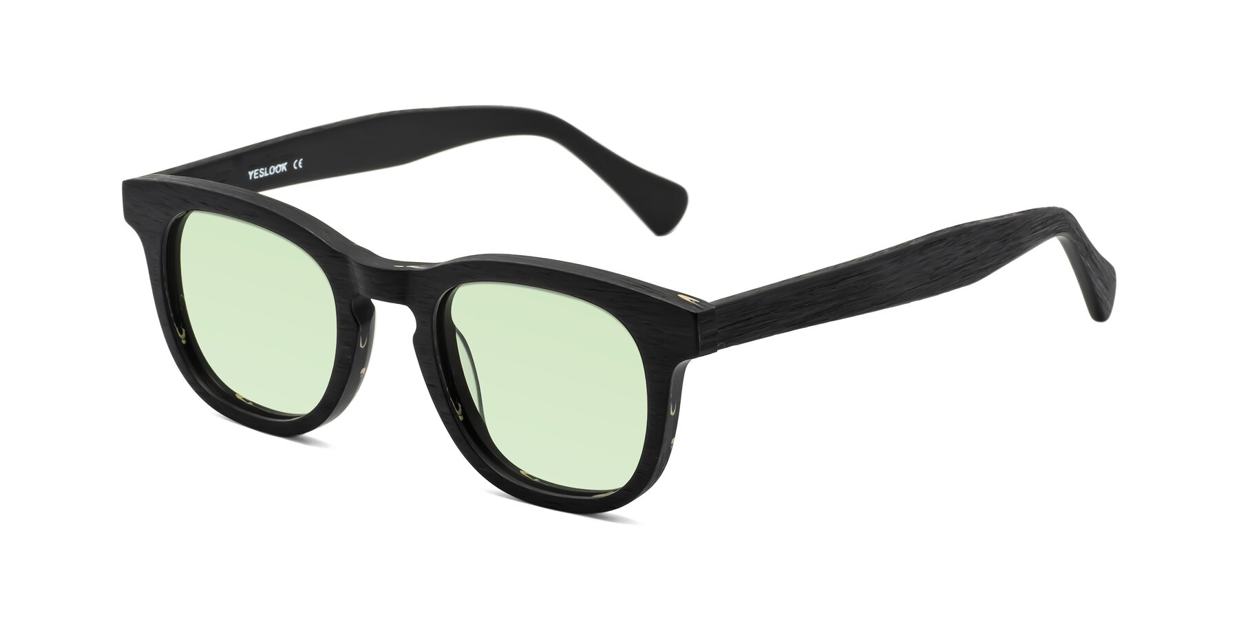 Angle of Tonia in Black Woodgrain with Light Green Tinted Lenses