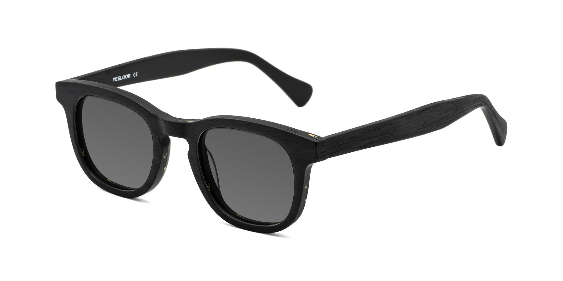 Angle of Tonia in Black Woodgrain with Medium Gray Tinted Lenses