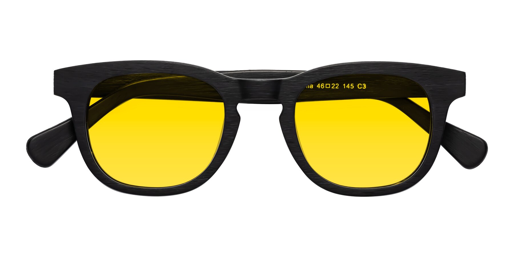 Folded Front of Tonia in Black Woodgrain with Yellow Tinted Lenses