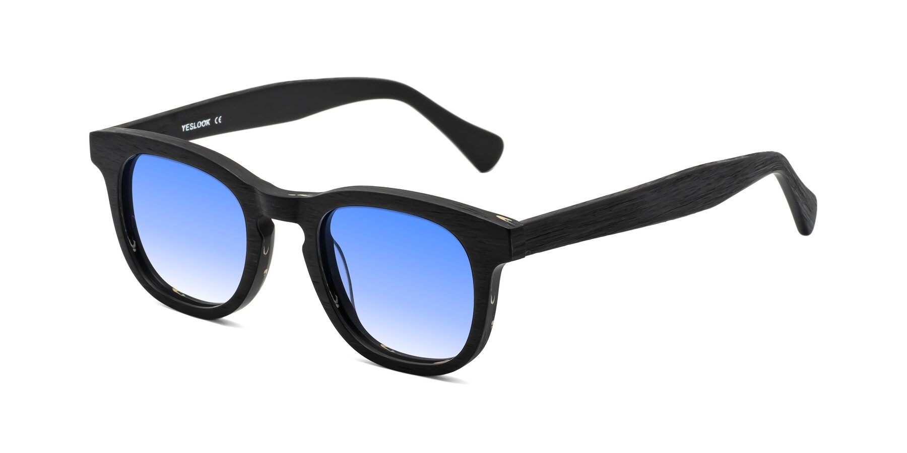 Angle of Tonia in Black Woodgrain with Blue Gradient Lenses