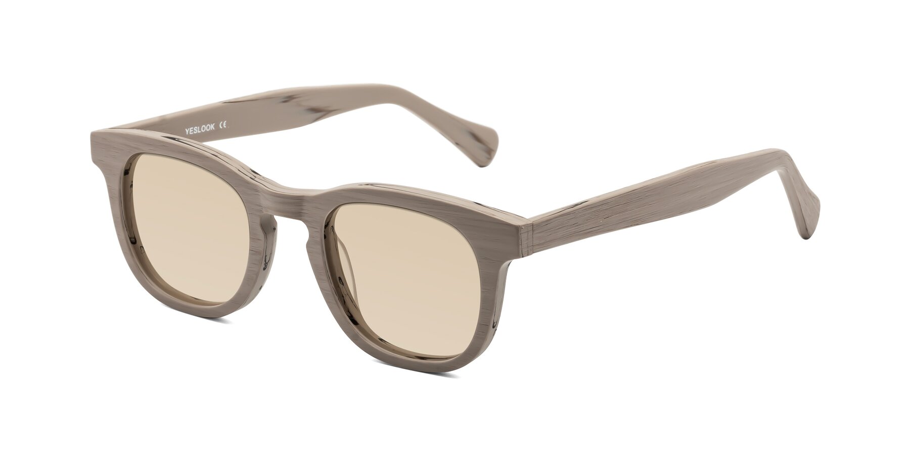 Angle of Tonia in Pale Mauve Woodgrain with Light Brown Tinted Lenses