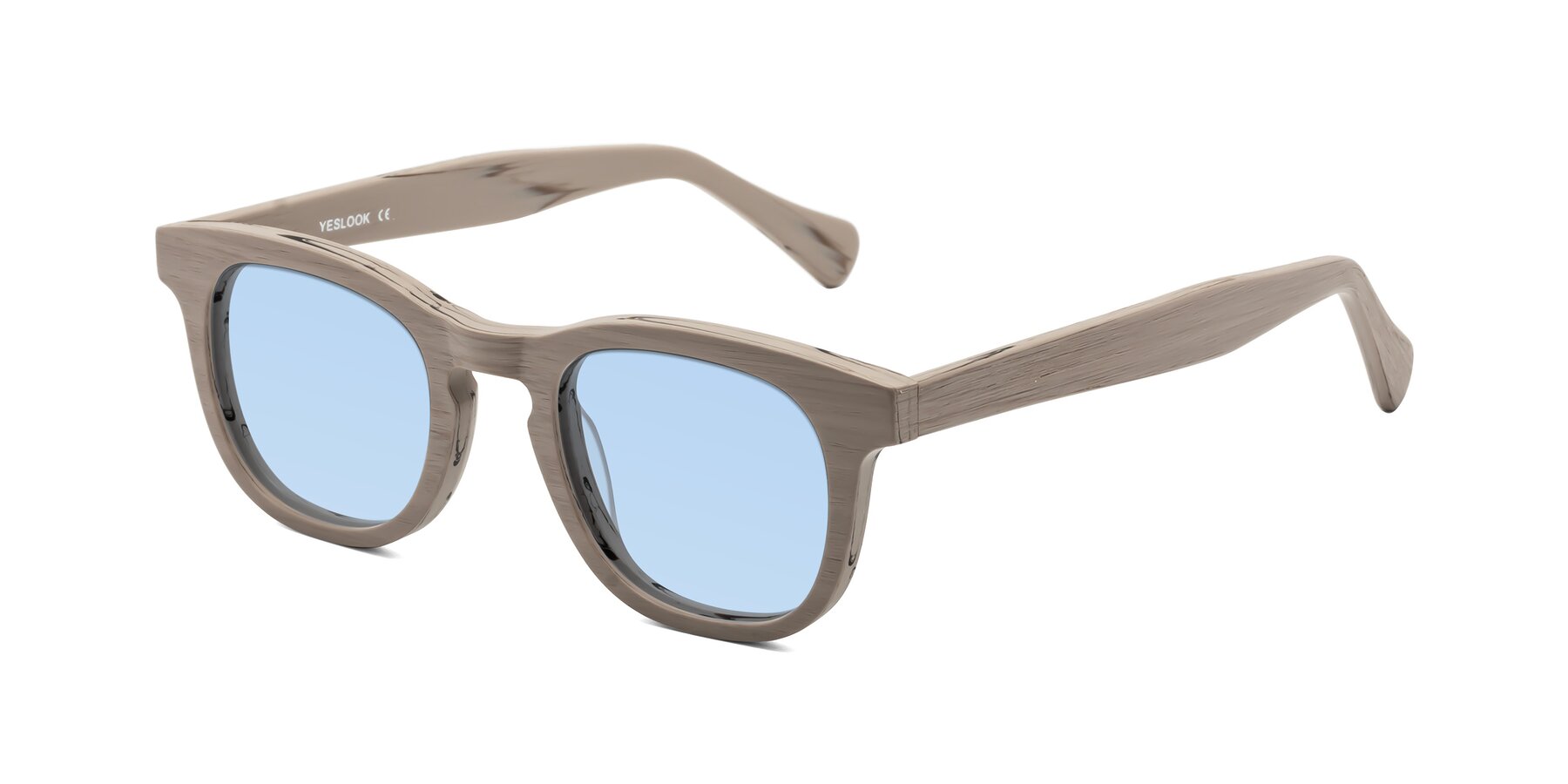 Angle of Tonia in Pale Mauve Woodgrain with Light Blue Tinted Lenses