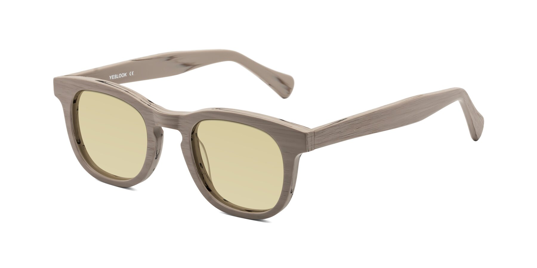 Angle of Tonia in Pale Mauve Woodgrain with Light Champagne Tinted Lenses