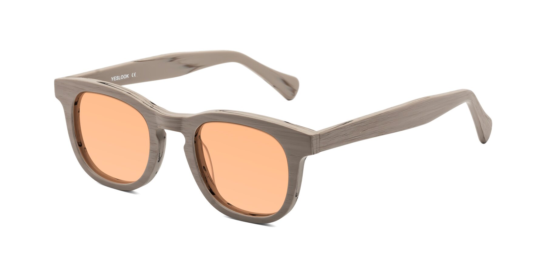 Angle of Tonia in Pale Mauve Woodgrain with Light Orange Tinted Lenses