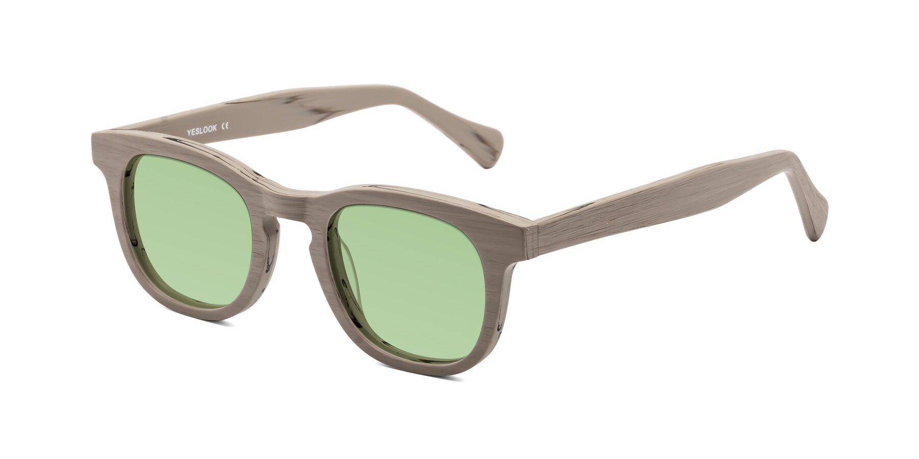 Angle of Tonia in Pale Mauve Woodgrain with Medium Green Tinted Lenses