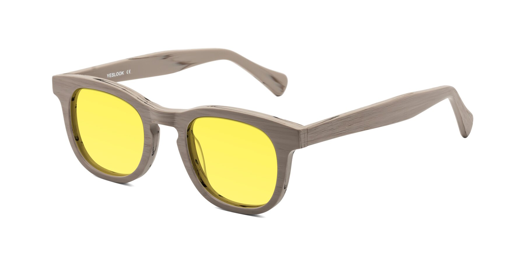 Angle of Tonia in Pale Mauve Woodgrain with Medium Yellow Tinted Lenses