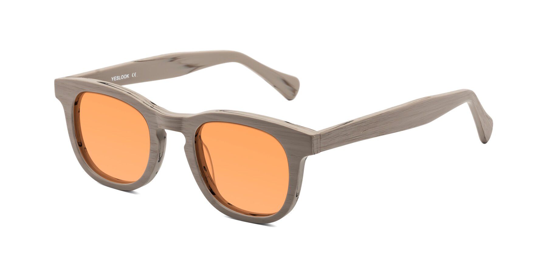 Angle of Tonia in Pale Mauve Woodgrain with Medium Orange Tinted Lenses