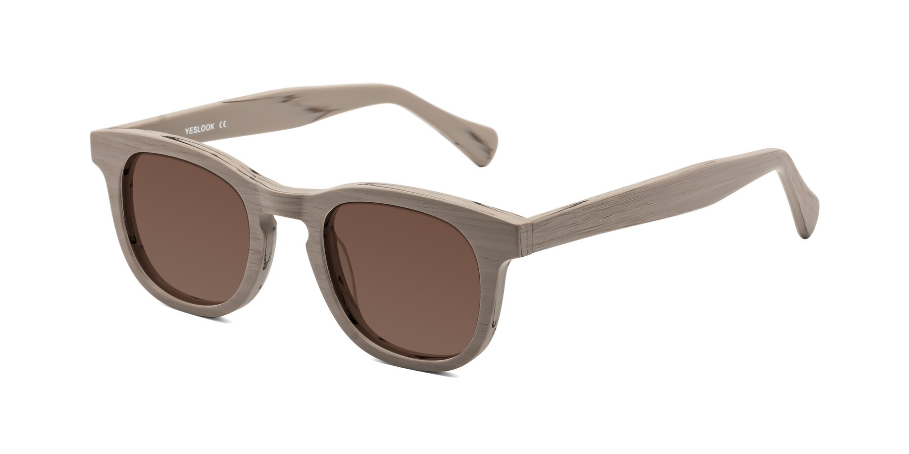 Angle of Tonia in Pale Mauve Woodgrain with Brown Tinted Lenses