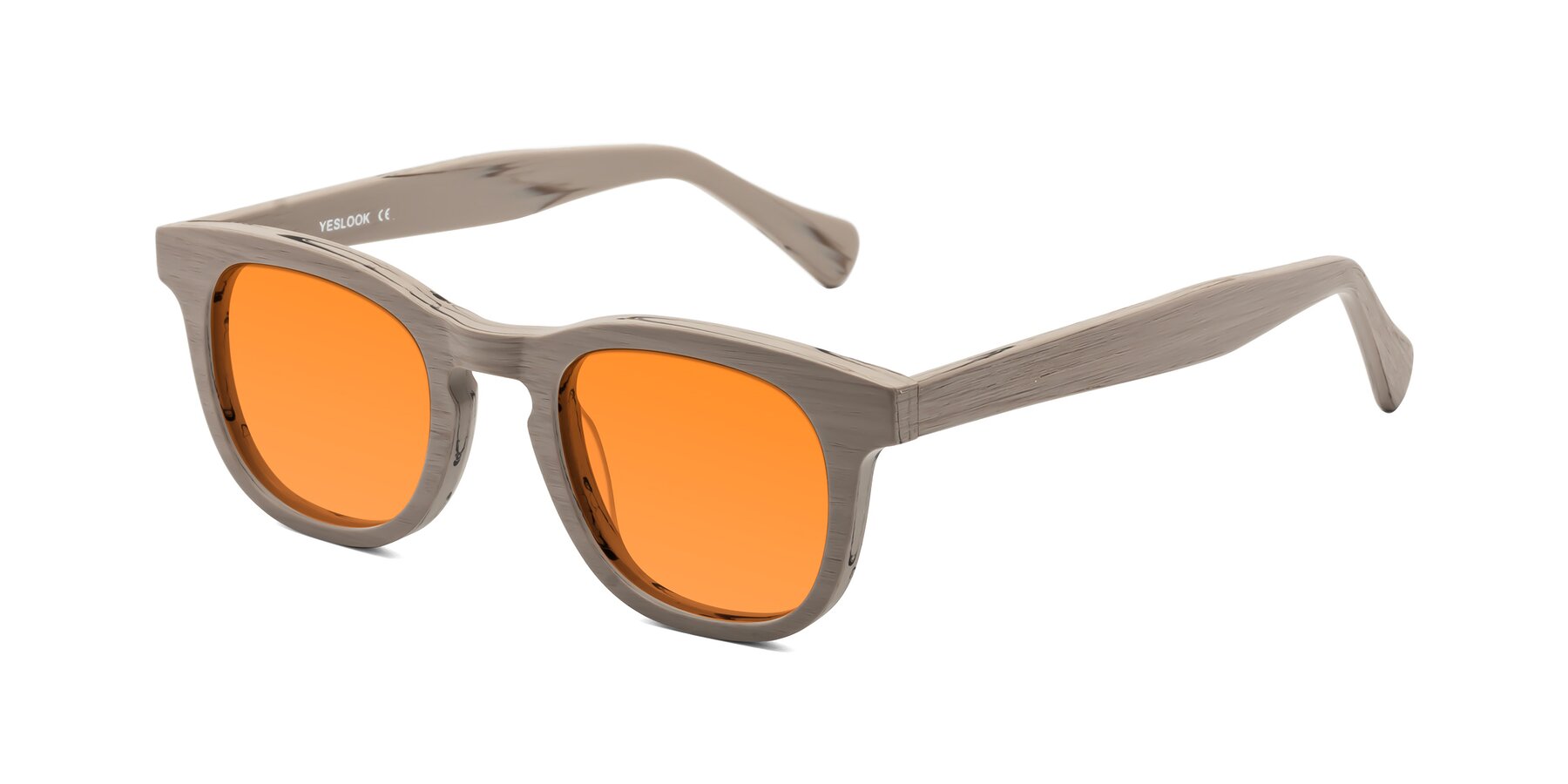 Angle of Tonia in Pale Mauve Woodgrain with Orange Tinted Lenses