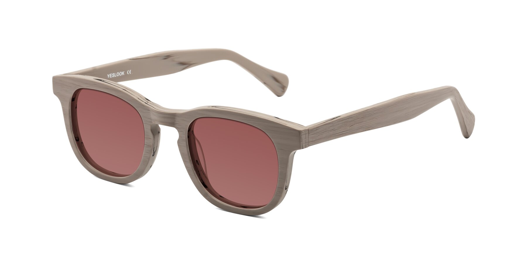 Angle of Tonia in Pale Mauve Woodgrain with Garnet Tinted Lenses