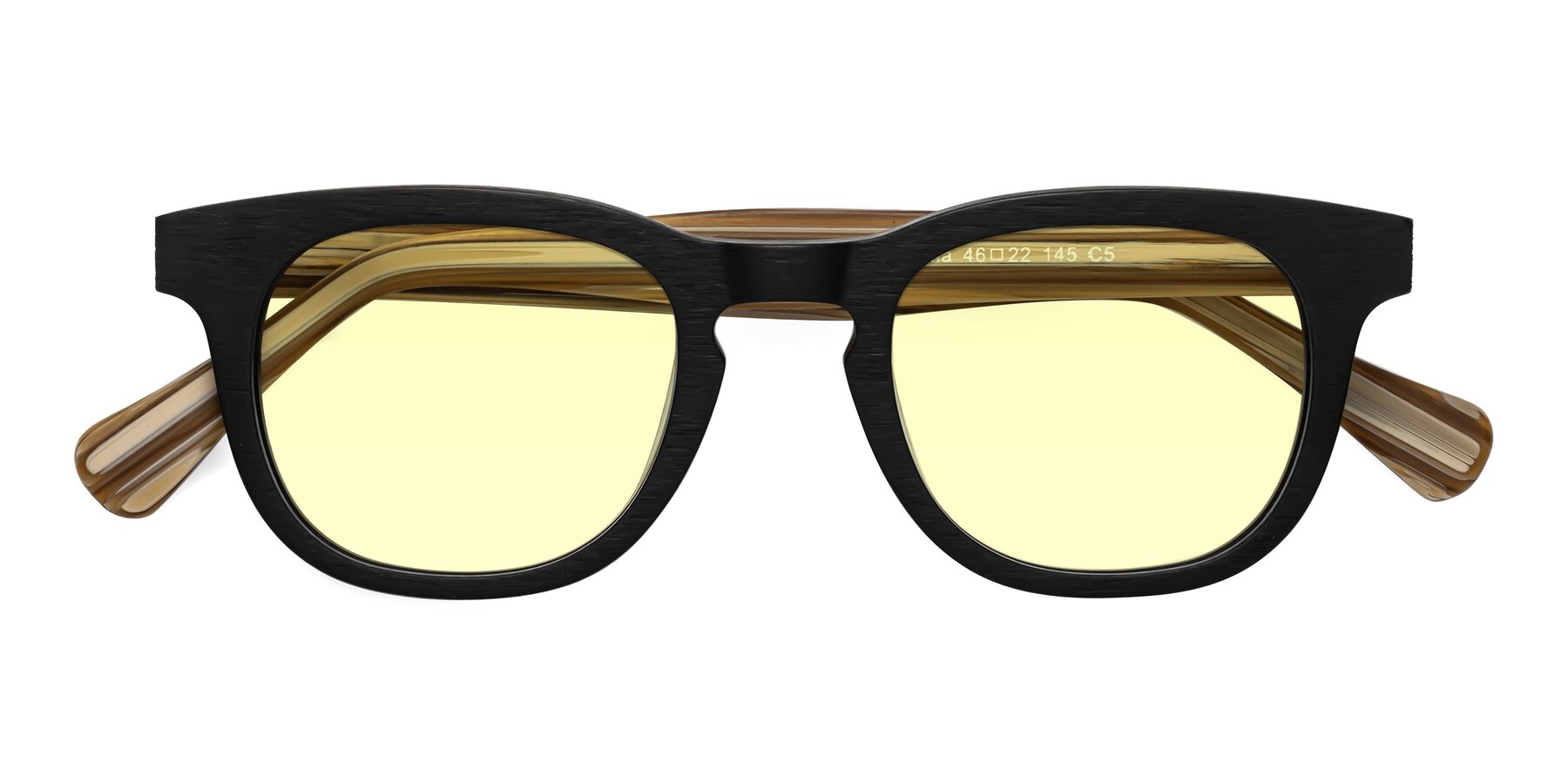 Folded Front of Tonia in Black-Sugar Woodgrain with Light Yellow Tinted Lenses