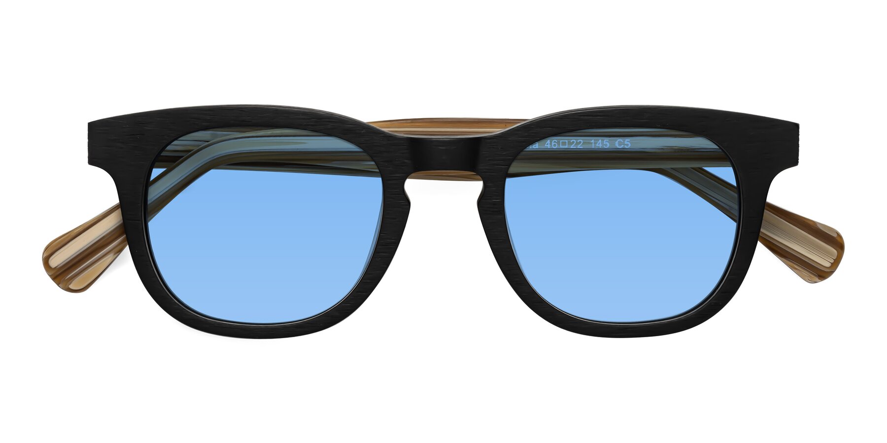 Folded Front of Tonia in Black-Sugar Woodgrain with Medium Blue Tinted Lenses