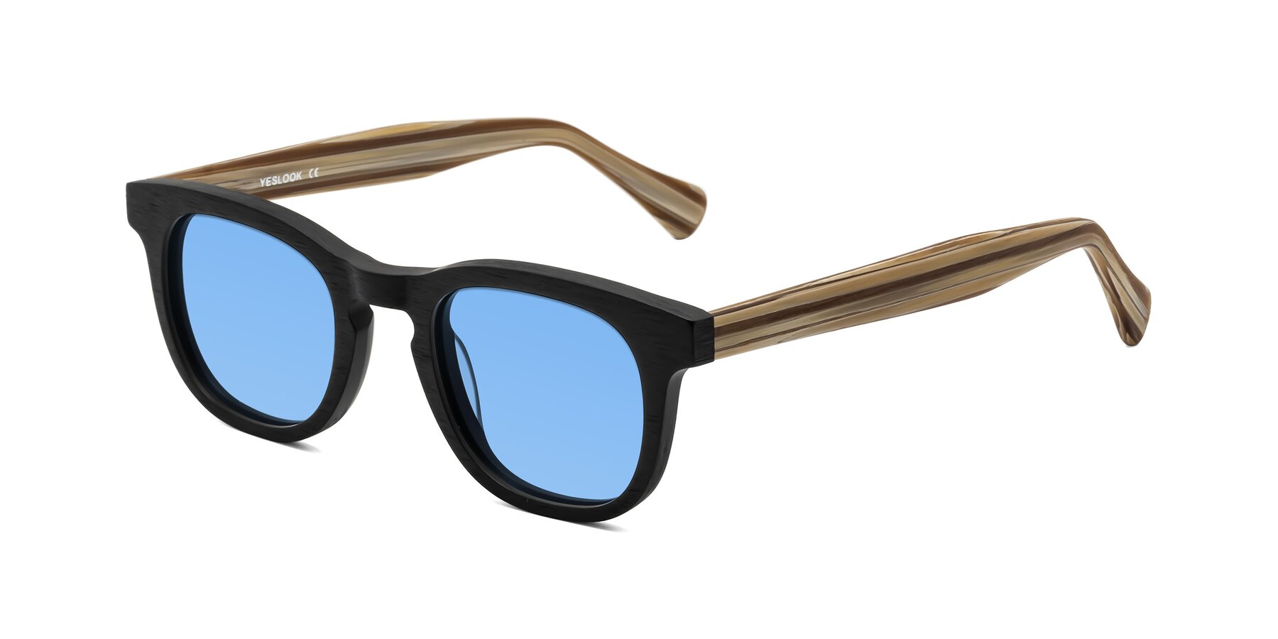 Angle of Tonia in Black-Sugar Woodgrain with Medium Blue Tinted Lenses