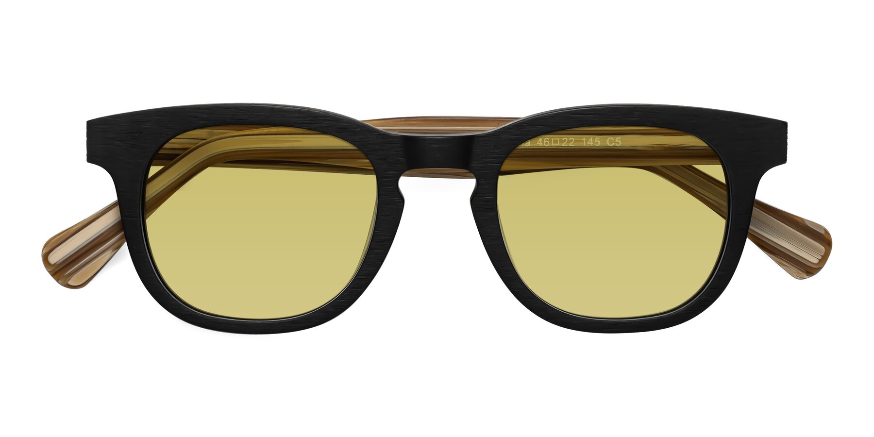 Folded Front of Tonia in Black-Sugar Woodgrain with Medium Champagne Tinted Lenses