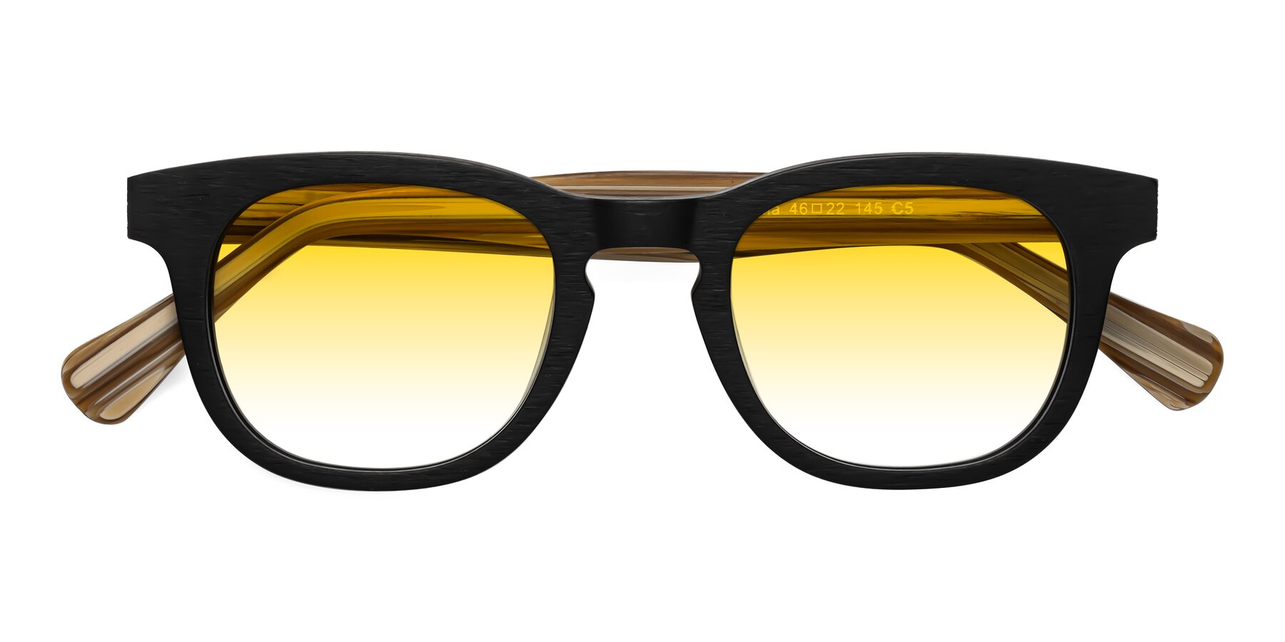 Folded Front of Tonia in Black-Sugar Woodgrain with Yellow Gradient Lenses