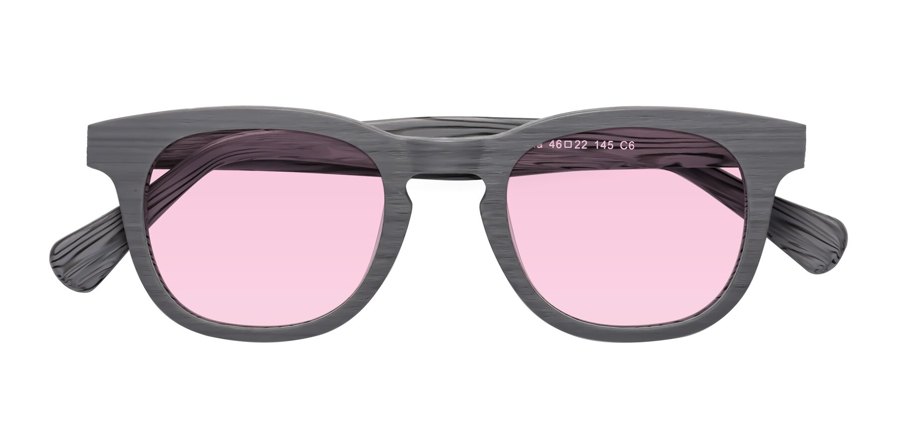 Folded Front of Tonia in Cement Woodgrain with Light Pink Tinted Lenses