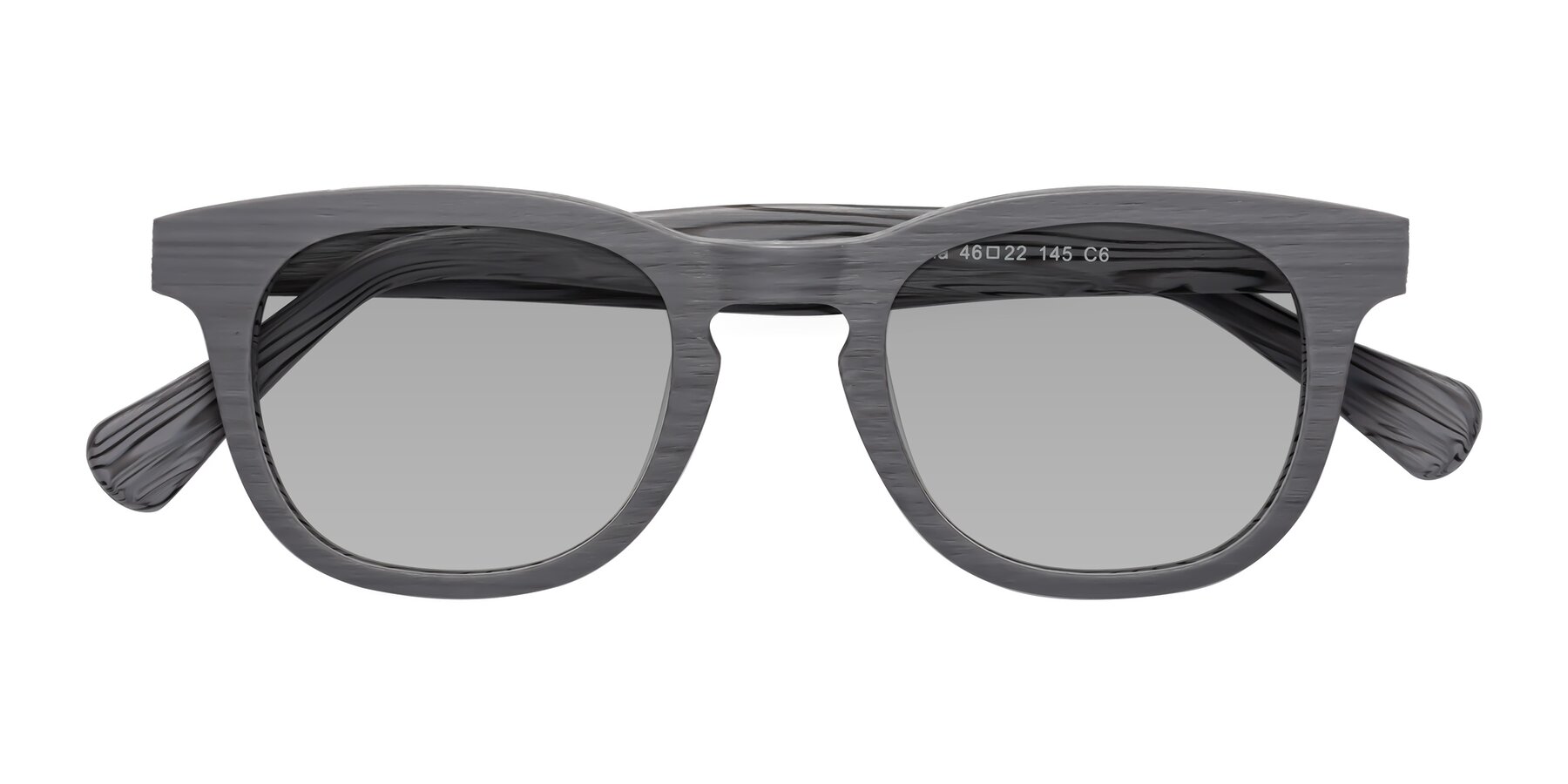 Folded Front of Tonia in Cement Woodgrain with Light Gray Tinted Lenses