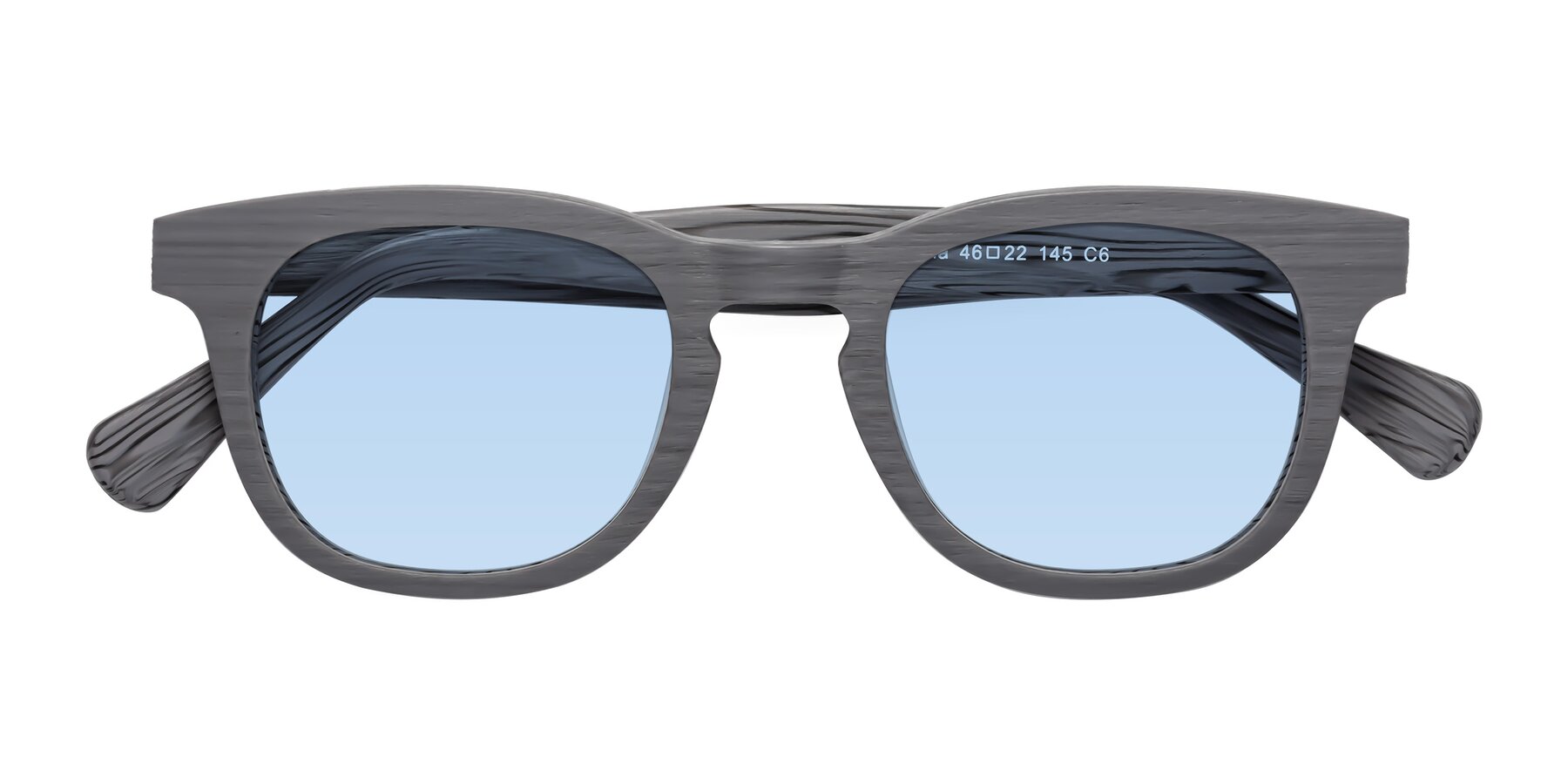 Folded Front of Tonia in Cement Woodgrain with Light Blue Tinted Lenses